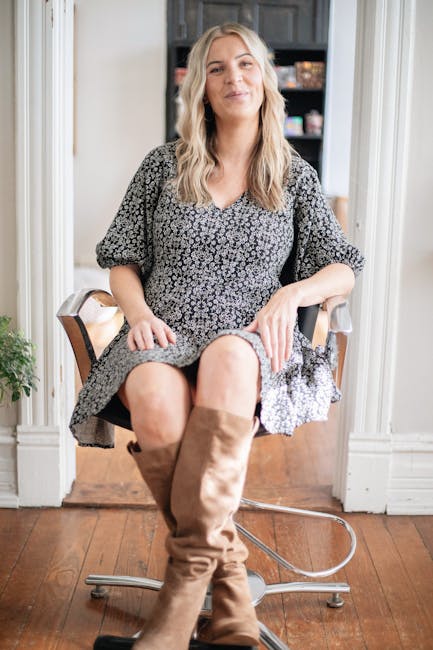 Chic and modern portrait of a woman stylist in a Brevard salon, exuding confidence and style.